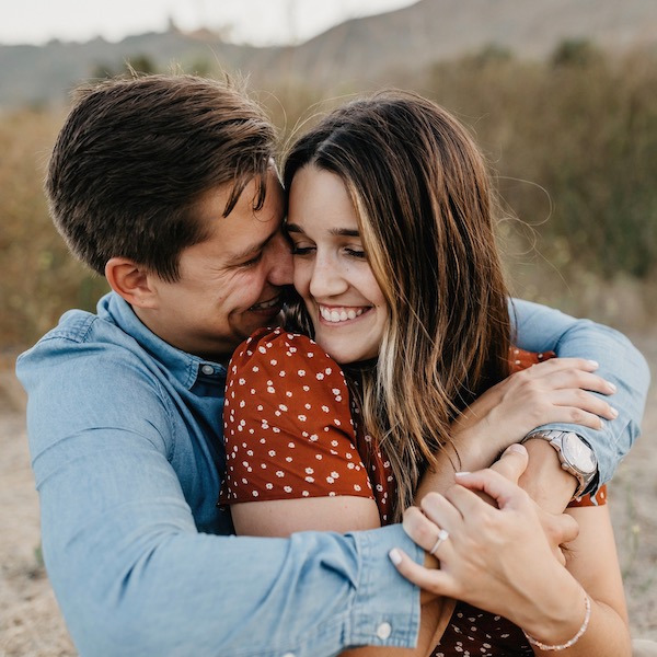 Couple hugging and smiling